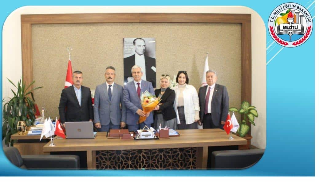 MHP MEZİTLİ İLÇE YÖNETİM KURULU ÜYELERİ, İLÇE MİLLİ EĞİTİM MÜDÜRÜMÜZ MEHMET BADAS'I MAKAMINDA ZİYARET ETTİ